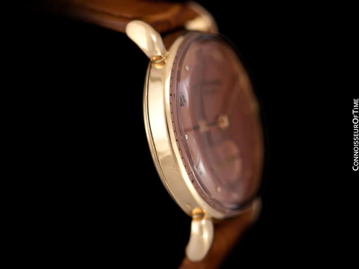 c. 1948 Patek Philippe Vintage Mens Midsize Handwound Watch, Ref. 1461 - 18K Rose Gold
