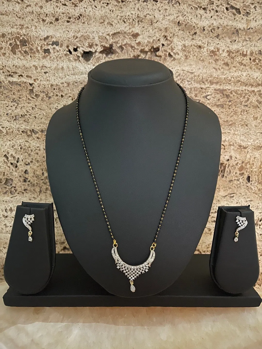 Short Mangalsutra designs set with diamond earrings simple gold mangalsutra black beads chain
