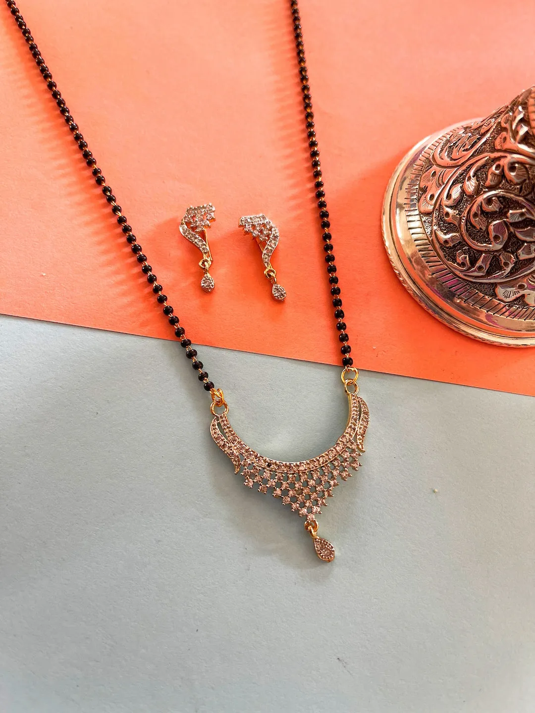 Short Mangalsutra designs set with diamond earrings simple gold mangalsutra black beads chain