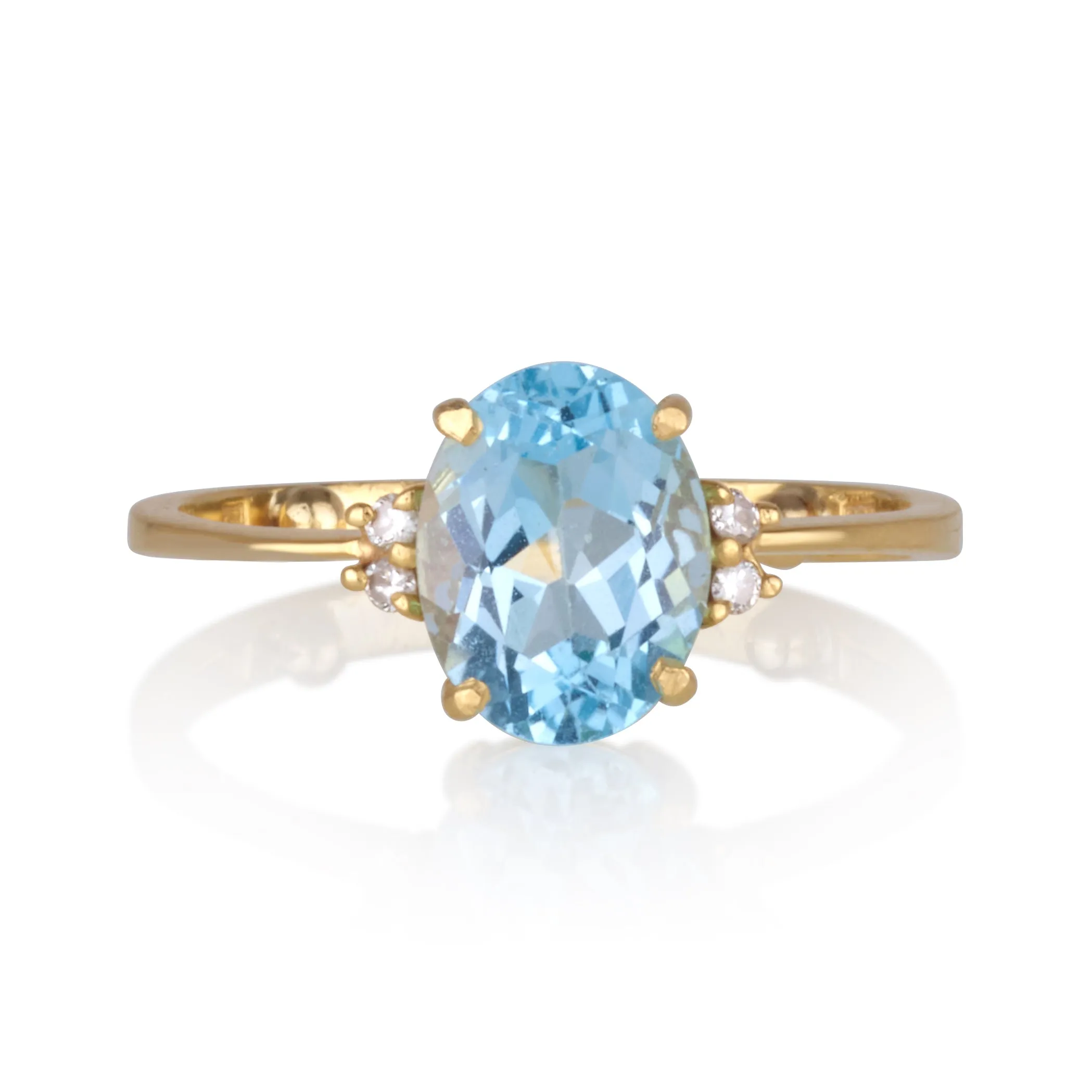 Spectrum | Dainty oval blue Topaz solitaire cocktail ring