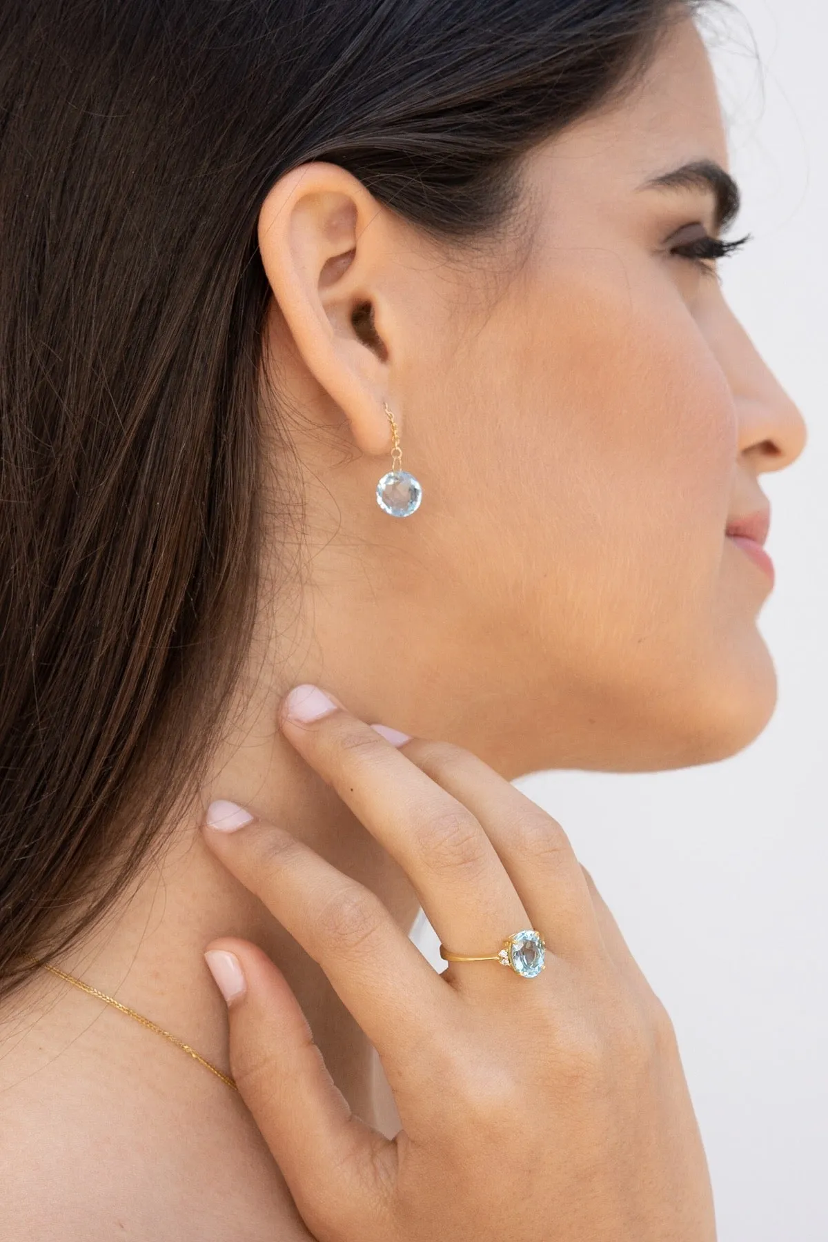 Spectrum | Dainty oval blue Topaz solitaire cocktail ring