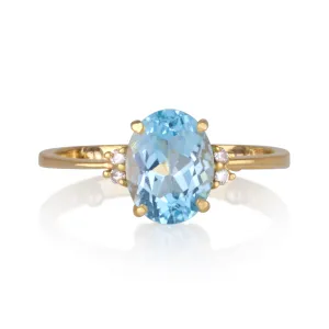 Spectrum | Dainty oval blue Topaz solitaire cocktail ring