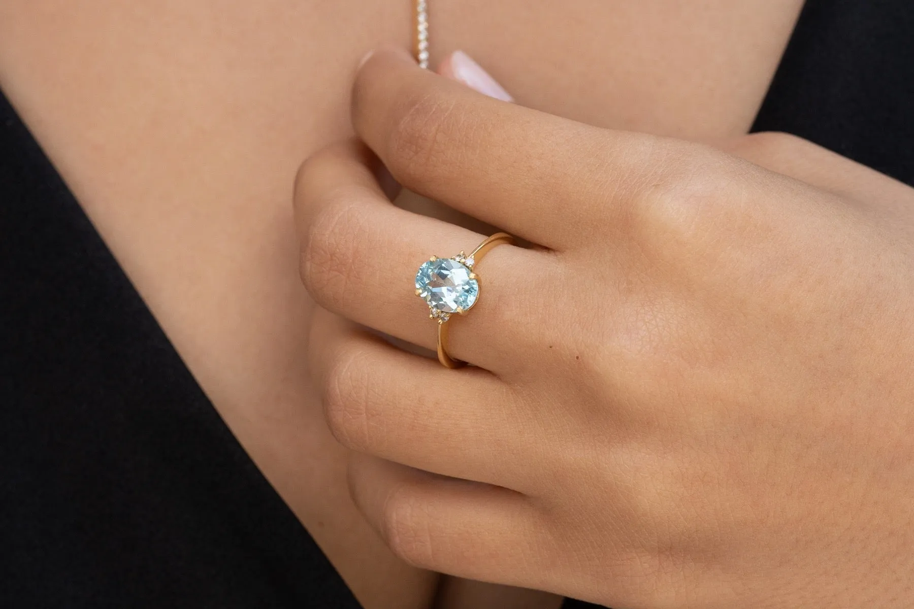 Spectrum | Dainty oval blue Topaz solitaire cocktail ring
